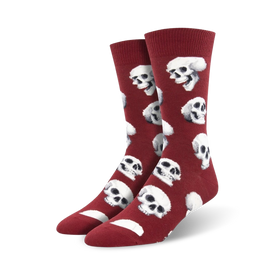 mens crew socks with realistic white skulls on a red background; halloween theme.  