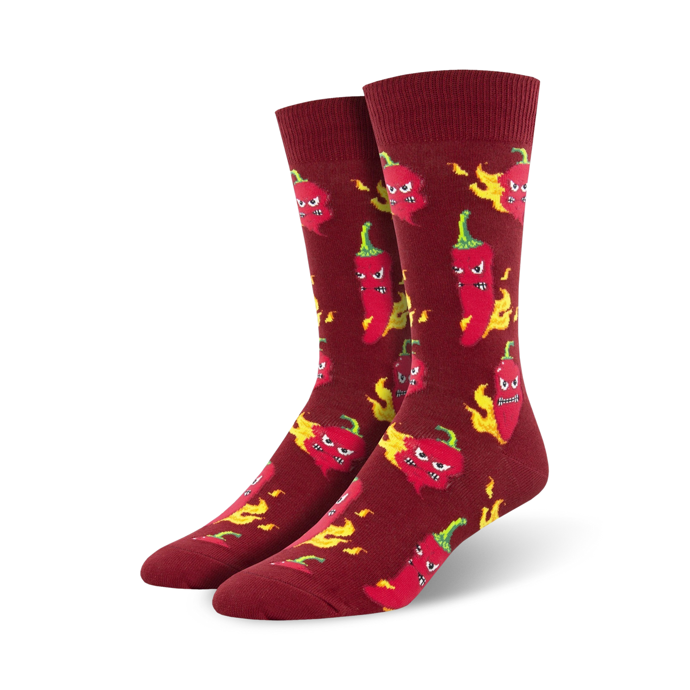 Lifestyle shot: Model wearing the Hot Stuff chili pepper socks with jeans and sneakers. 