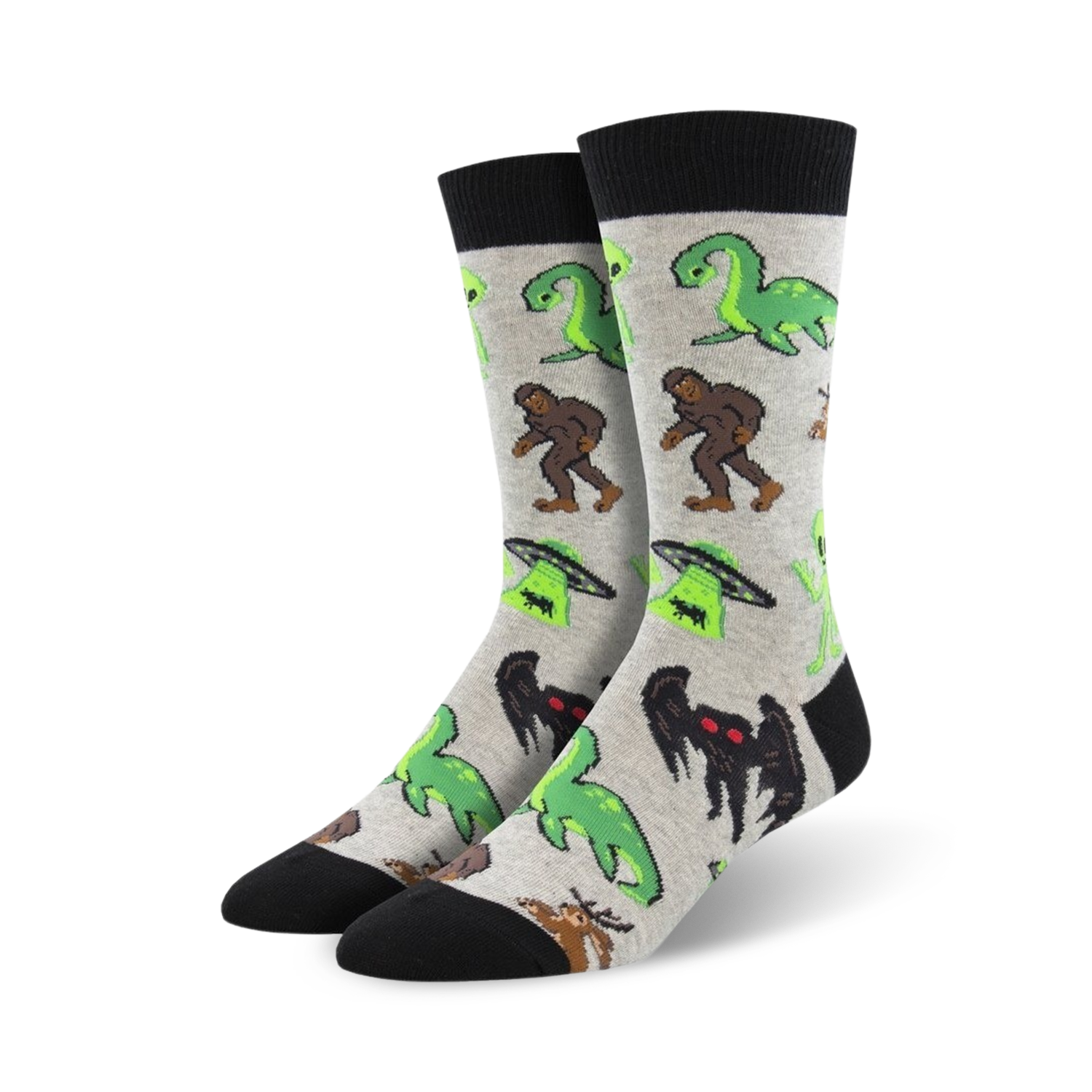 Pair of crew socks in grey and black, featuring a fun print of various cryptids including Bigfoot, Nessie, and aliens.