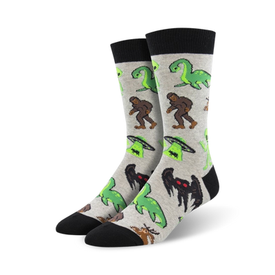 mens gray crew cryptids socks depicting bigfoot, loch ness monster, ufo, jersey devil, mothman, chupacabra.  