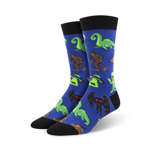 Close-up of blue Cryptids socks showcasing the vibrant color and detailed design of the mythical creatures.