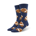 Pair of navy blue crew socks with a pattern of brown and white footballs.
