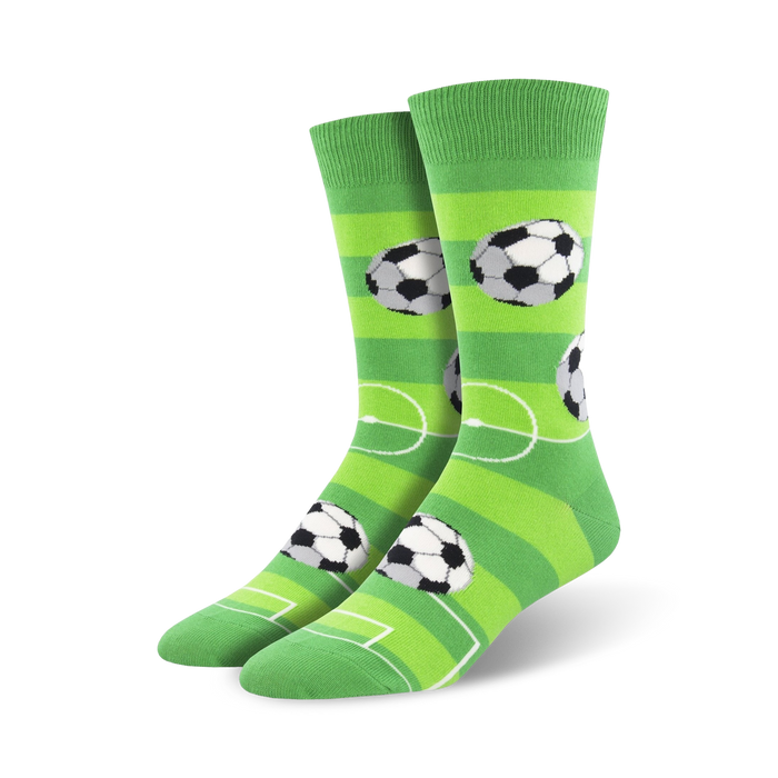 green crew socks with black and white soccer balls and white lines. men's.    }}