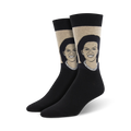Pair of crew socks featuring a portrait of Michelle Obama. The socks are black with a beige panel showcasing the image and have a comfortable fit.
