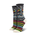 Crew socks in dark gray with colorful rainbow stripes at the bottom and a quote that says, "Try to be a rainbow in someone's cloud." 