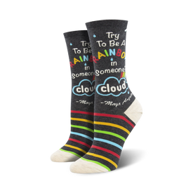 black and white women's crew socks with inspiring maya angelou quote and a multi-colored striped top.  