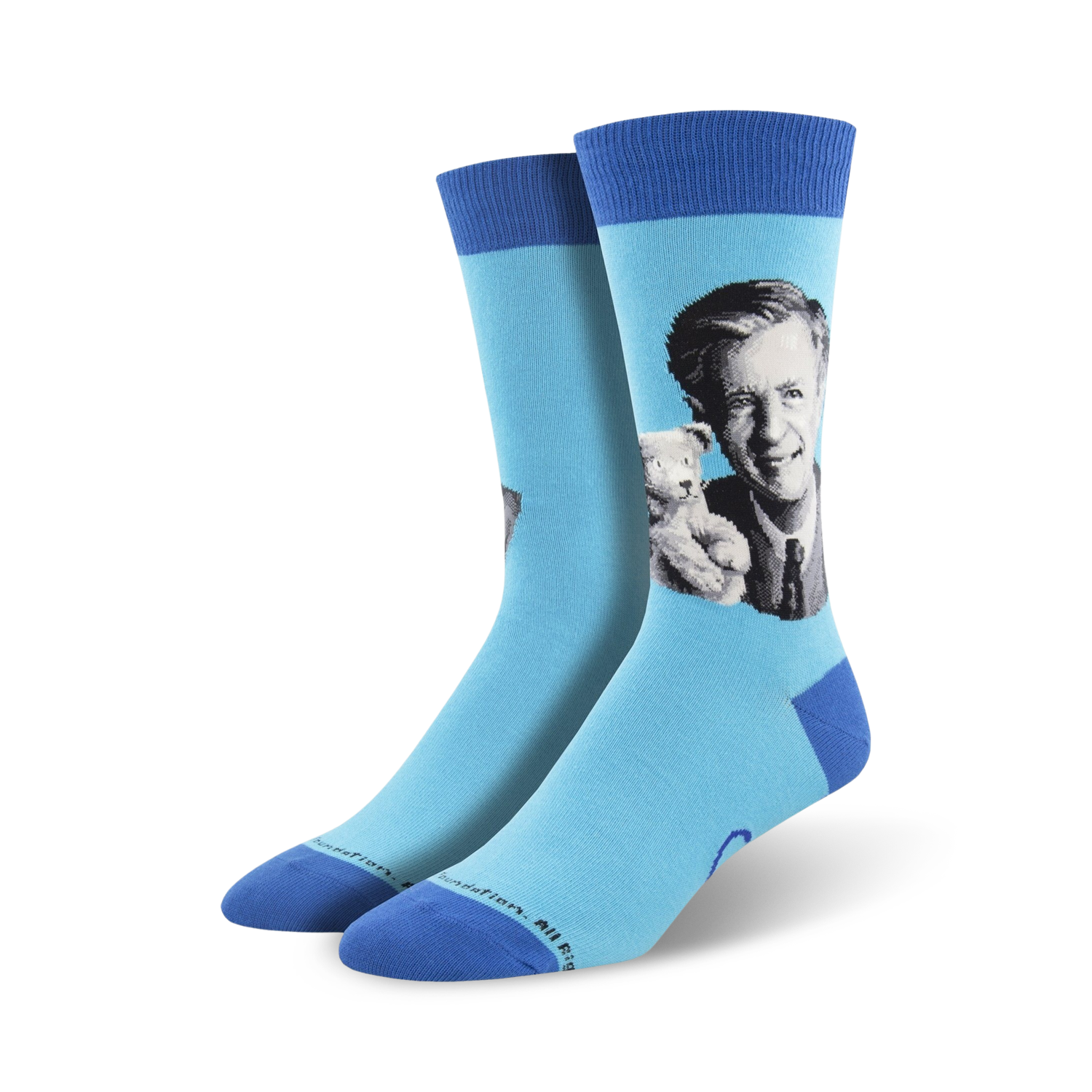 A pair of light blue crew socks with a portrait of Mister Rogers holding a teddy bear. The socks have a navy blue cuff.