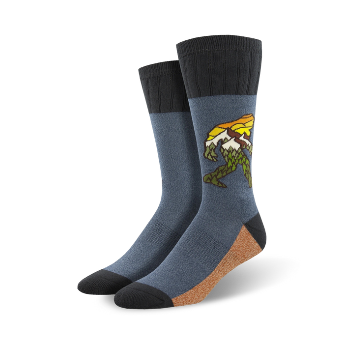 dark blue, brown, and black cotton crew socks featuring green and yellow bigfoot carrying sunset.   }}