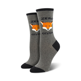 women's crew socks in gray and black have a repeating pattern of an orange fox's face with the words 'zero fox given' underneath.  