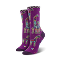 Women's crew socks in purple featuring a mosaic-style giraffe family design.  Multicolored giraffes on a deep purple background. 