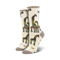 Lifestyle shot of the cream-colored Giraffe Family socks, showcasing the socks on a model's feet.