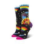 Women's crew socks in black with a colorful rainbow, sun, moon, and stars design. Pink heel and toe.