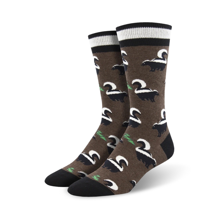 cartoony black and white skunks cover these brown crew socks, designed for men, for a humorous and interesting design.   