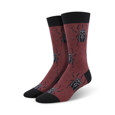 mens burgundy crew socks with black beetle pattern.  