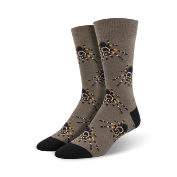crew socks featuring a pattern of black and yellow tarantula spiders crawling in various directions.  
