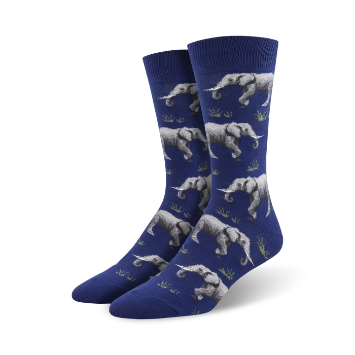 dark blue crew socks with pattern of gray elephants with white tusks on green grass.  