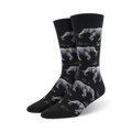 Flatlay: Three pairs of 'Raising a Herd' socks, in navy, green, and black.