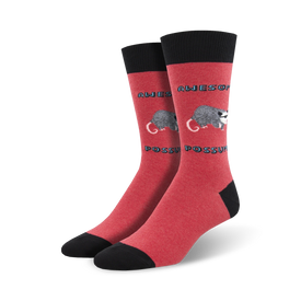 red and black awesome possum socks with blue and black text declaring the same. mens crew socks.   