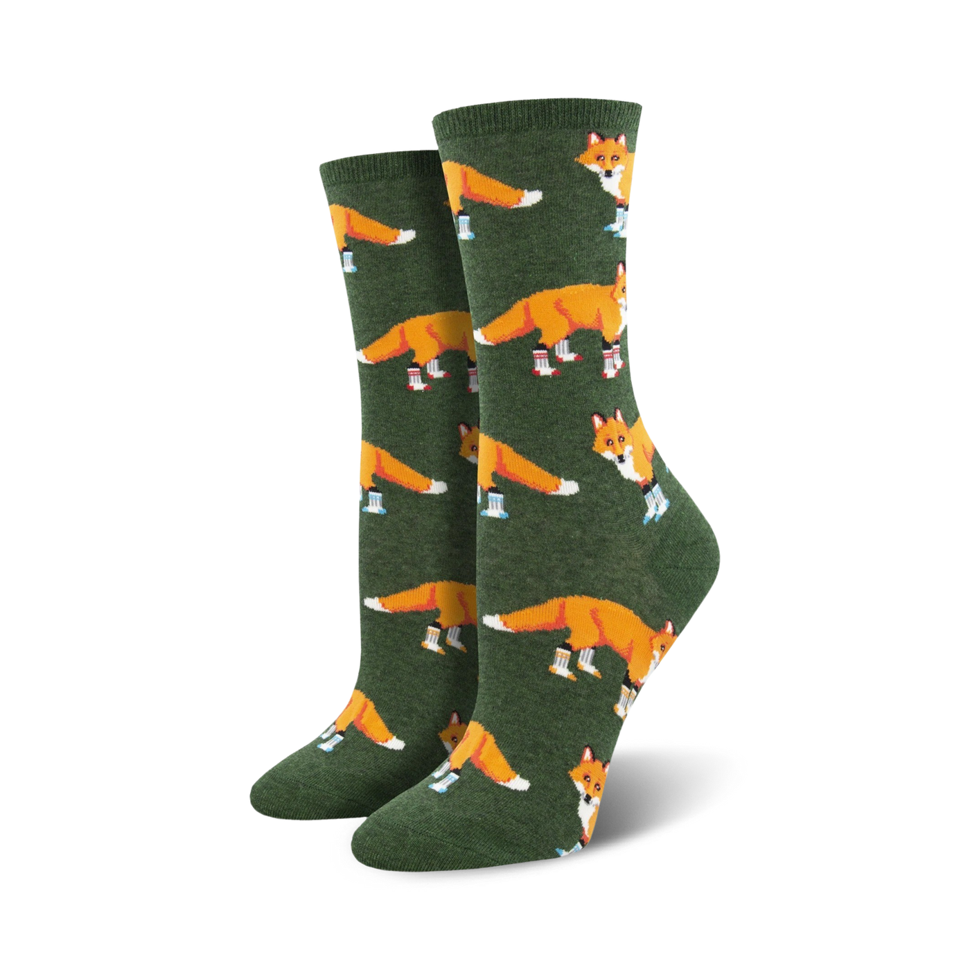 Lifestyle shot of Socksy Foxes socks on a woman's feet, showing the socks in the green colorway.