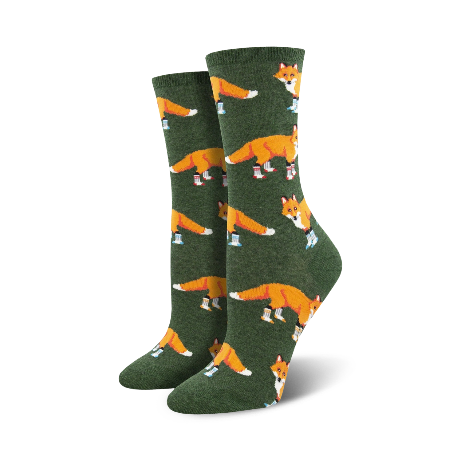 Lifestyle shot of Socksy Foxes socks on a woman's feet, showing the socks in the green colorway.