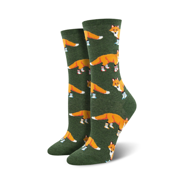  dark forest green crew socks for women with a pattern of cartoon foxes in blue socks.  