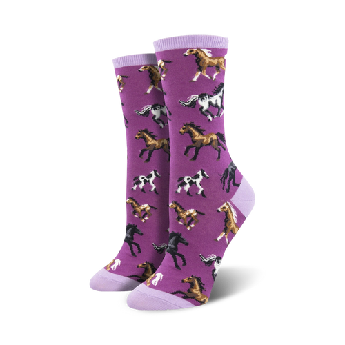 Pair of women's crew socks; purple and lime green options; playful design of multicolored horses running.