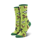 Lifestyle shot showing a model wearing the lime green horse socks.