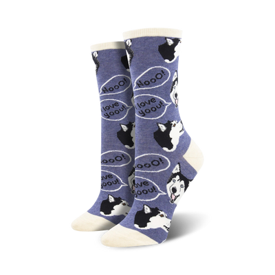 blue crew socks with a pattern of howling cartoon husky dogs inside speech bubbles.   