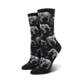 Pair of crew socks featuring a repeating pattern of gray elephants and green grass on a black background.
