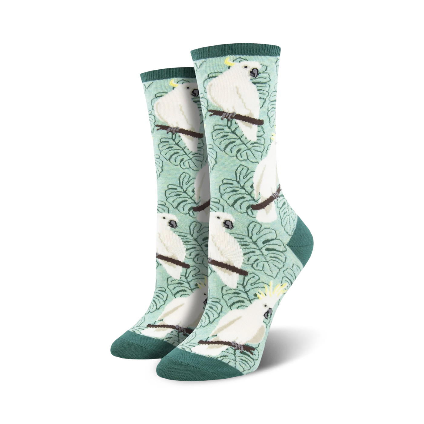 Pair of women's crew socks. Teal background with white cockatoos and green leaves.  Coral version also available.