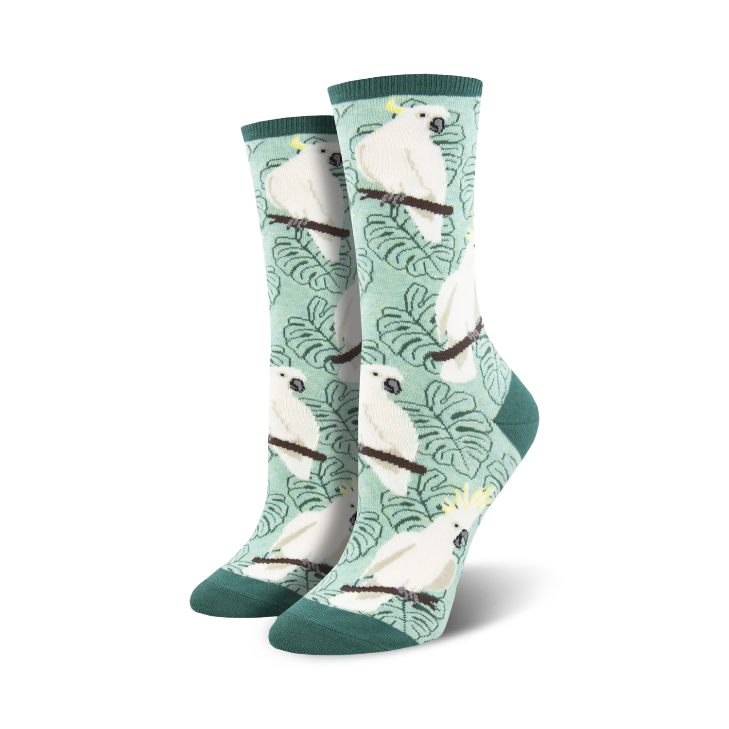 Pair of women's crew socks. Teal background with white cockatoos and green leaves.  Coral version also available.