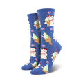 Lifestyle shot of a person's feet wearing blue Taiyaki Cat crew socks. The socks showcase the adorable cat and taiyaki design.