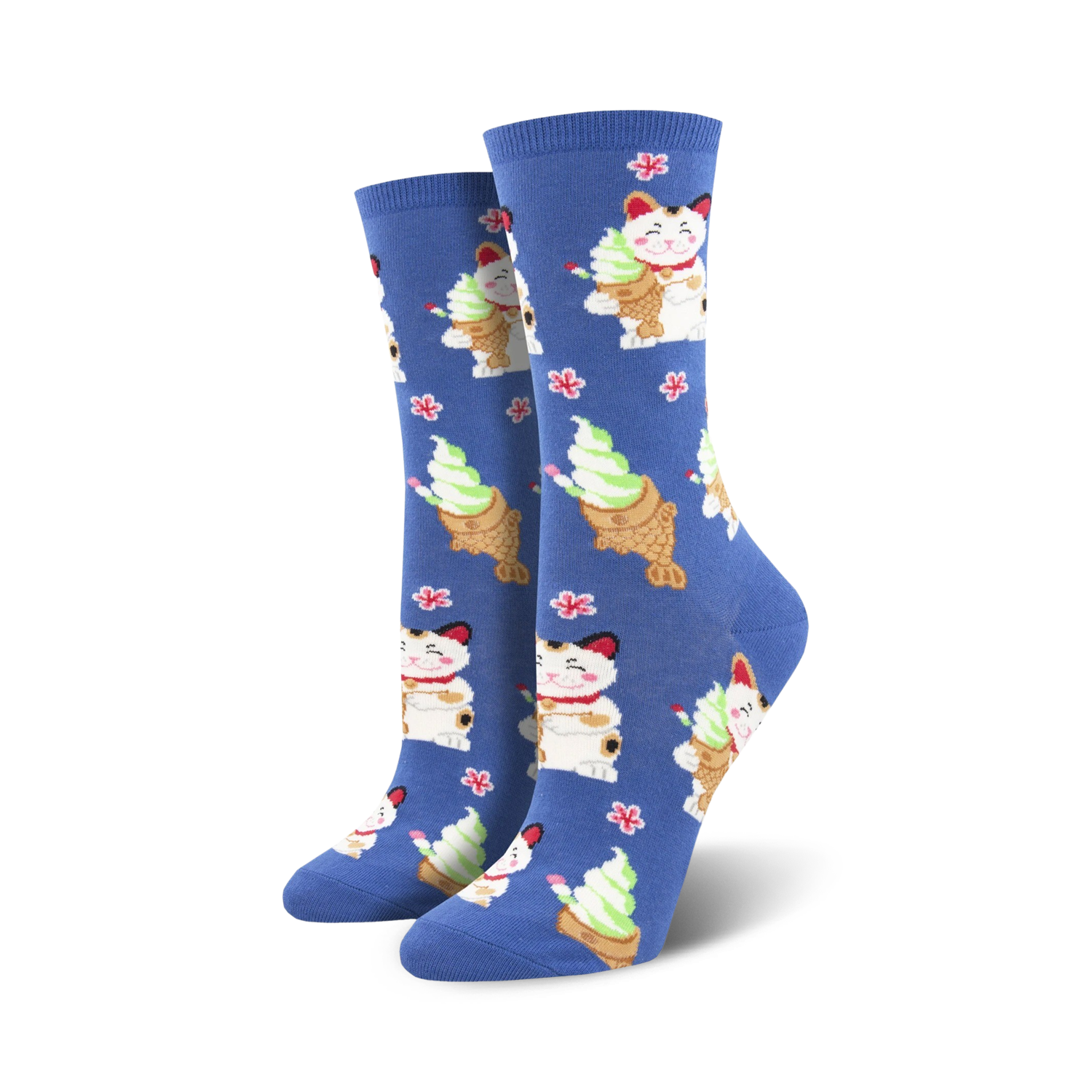 Lifestyle shot of a person's feet wearing blue Taiyaki Cat crew socks. The socks showcase the adorable cat and taiyaki design.