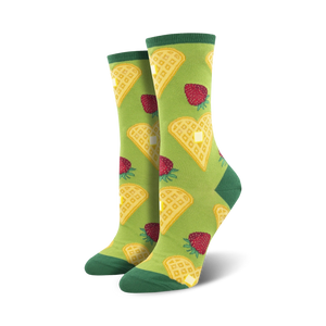 womens crew socks with repeating pattern of cartoonish waffles, strawberries, and pats of butter on a light green background.  