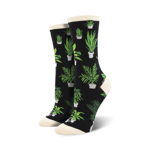 black crew socks with a pattern of green houseplants in pots.  