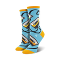 Lifestyle shot showing the light blue 'Caught On Tape' socks with orange cuffs on a person's feet.