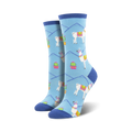 Pair of women's crew socks in light blue. Features a repeating pattern of white llamas with colorful saddles, cacti in pink pots, and light blue mountains.