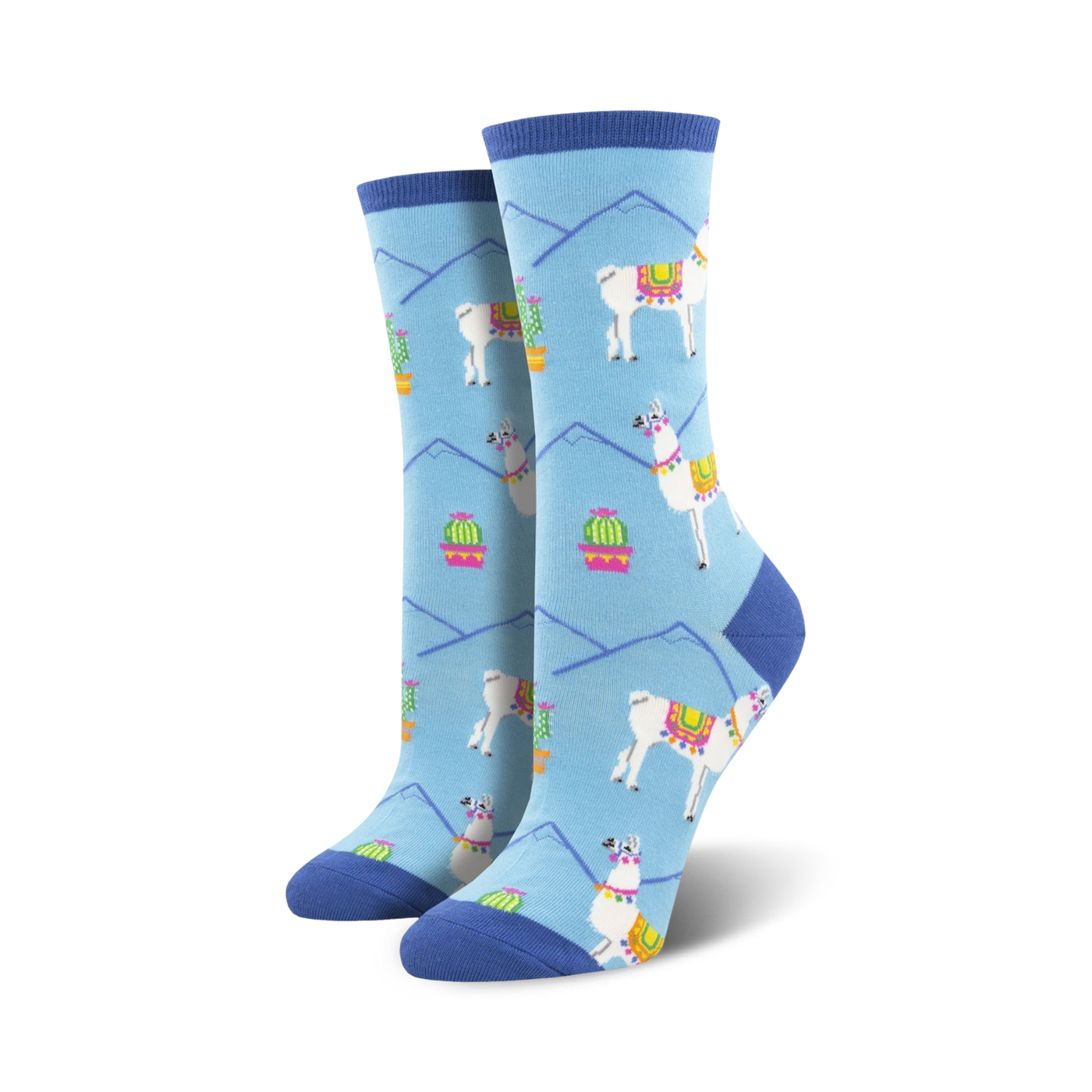 Pair of women's crew socks in light blue. Features a repeating pattern of white llamas with colorful saddles, cacti in pink pots, and light blue mountains.