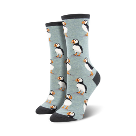 womens crew socks mid-calf length with eight black & white puffins on light blue background   