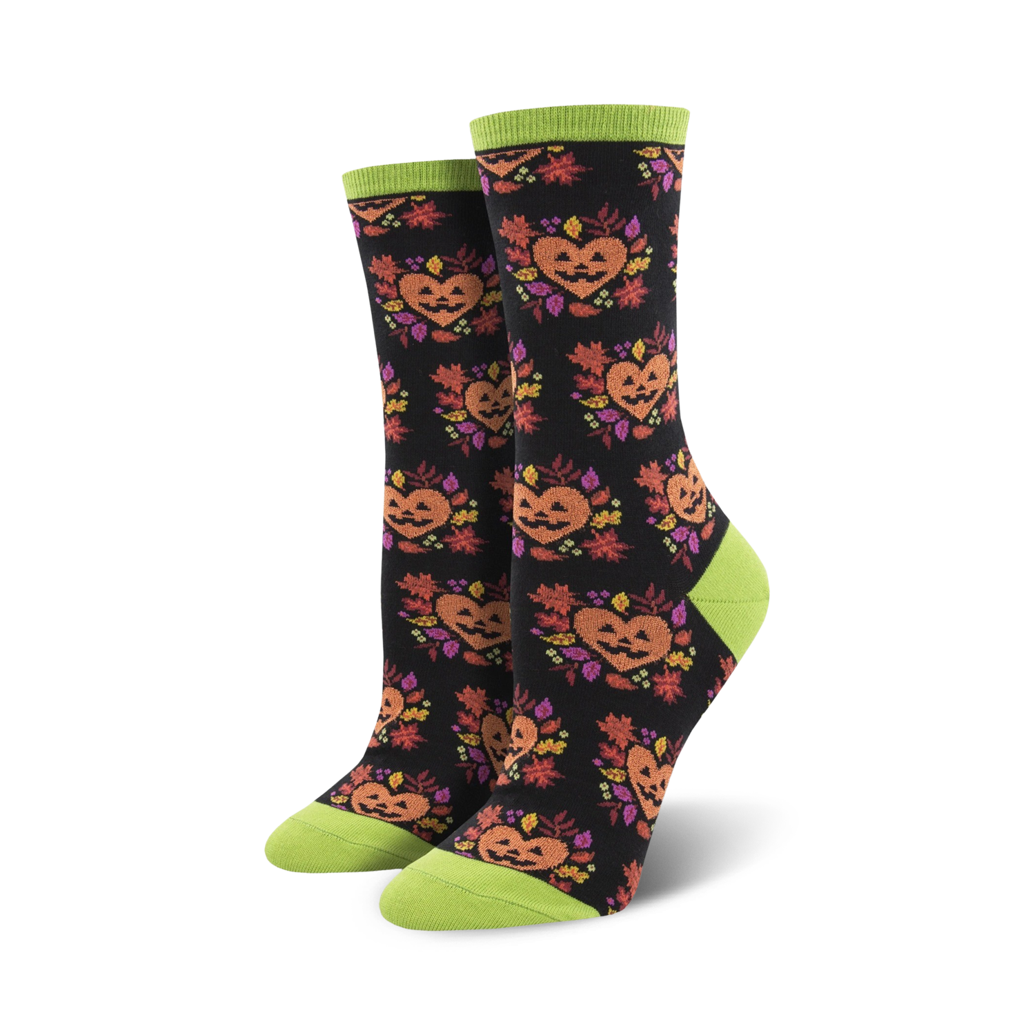 A pair of black crew socks with the same jack-o'-lantern design, but on a black background with lime green cuffs.