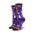 Purple crew socks with a Halloween theme.  Features ghosts, spiders, bats, pumpkins, candy corn, and eyeballs on a purple background.