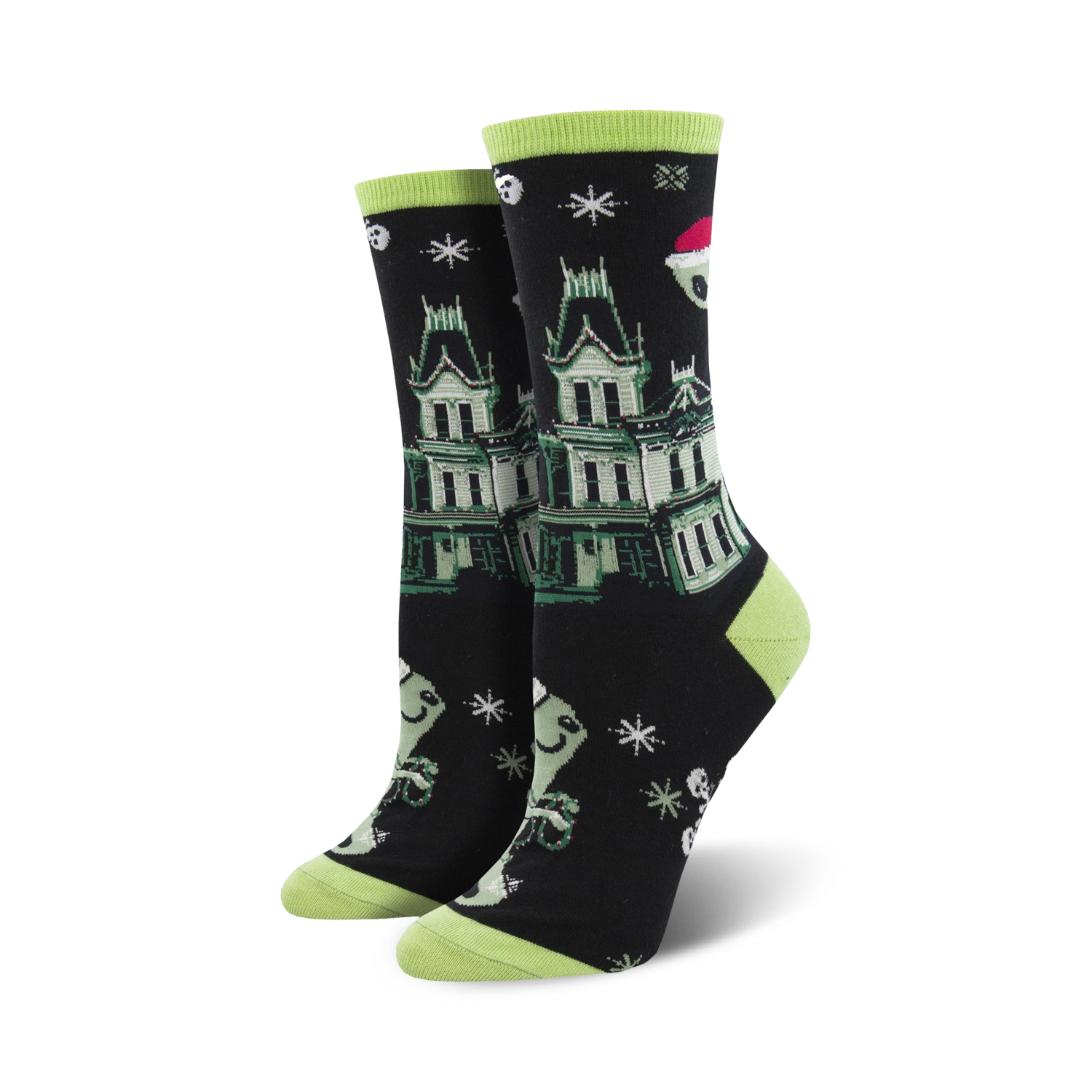 A pair of black crew socks with a green haunted house, ghosts wearing Santa hats, and snowflakes. Lime green cuffs.