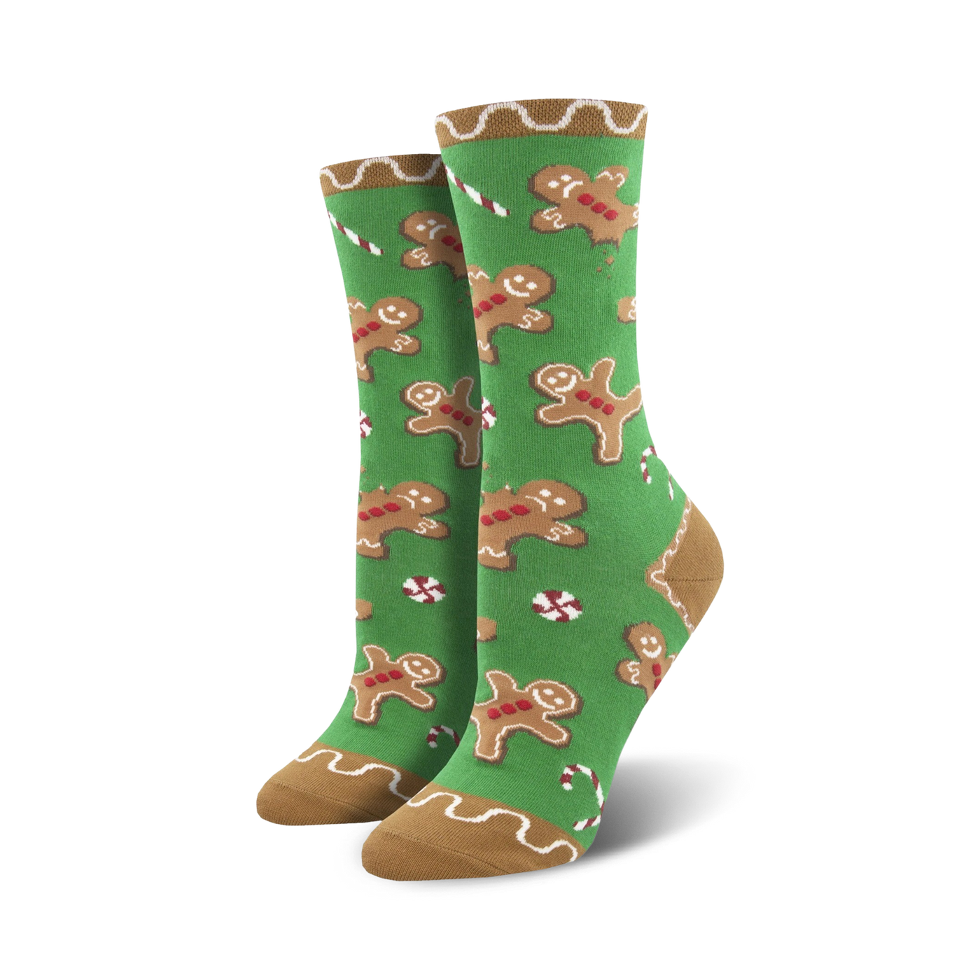 Pair of crew socks with a festive design. Green background with gingerbread men and candy canes. Tan cuff.