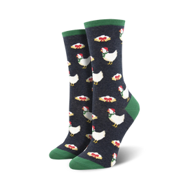 women's dark blue crew socks featuring a pattern of white chickens wearing santa hats and green ribbons. christmas-themed.   