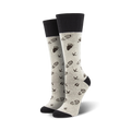 Pair of grey wool crew socks with a dark brown print of footprints and paw prints.  Black cuff.