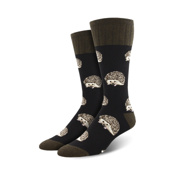 black crew socks for men and women with a pattern of cartoon hedgehogs with a white belly and brown quills on a dark olive green background.   