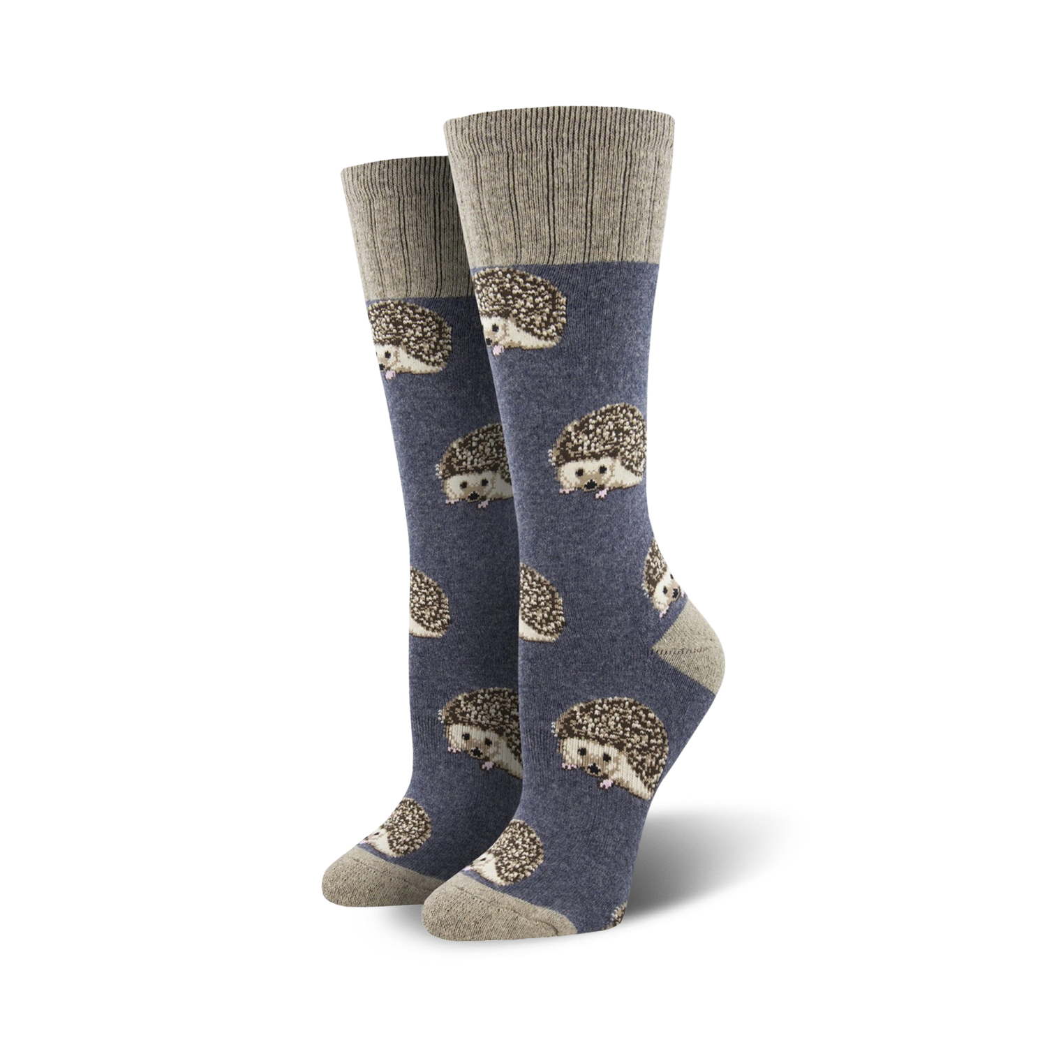 A lifestyle shot showing the blue hedgehog socks on a model's feet, showcasing how they look when worn.