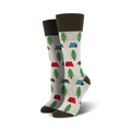 Pair of crew socks with a camping theme.  Light grey background with green trees, red and blue tents, and brown bears. Dark brown cuff.