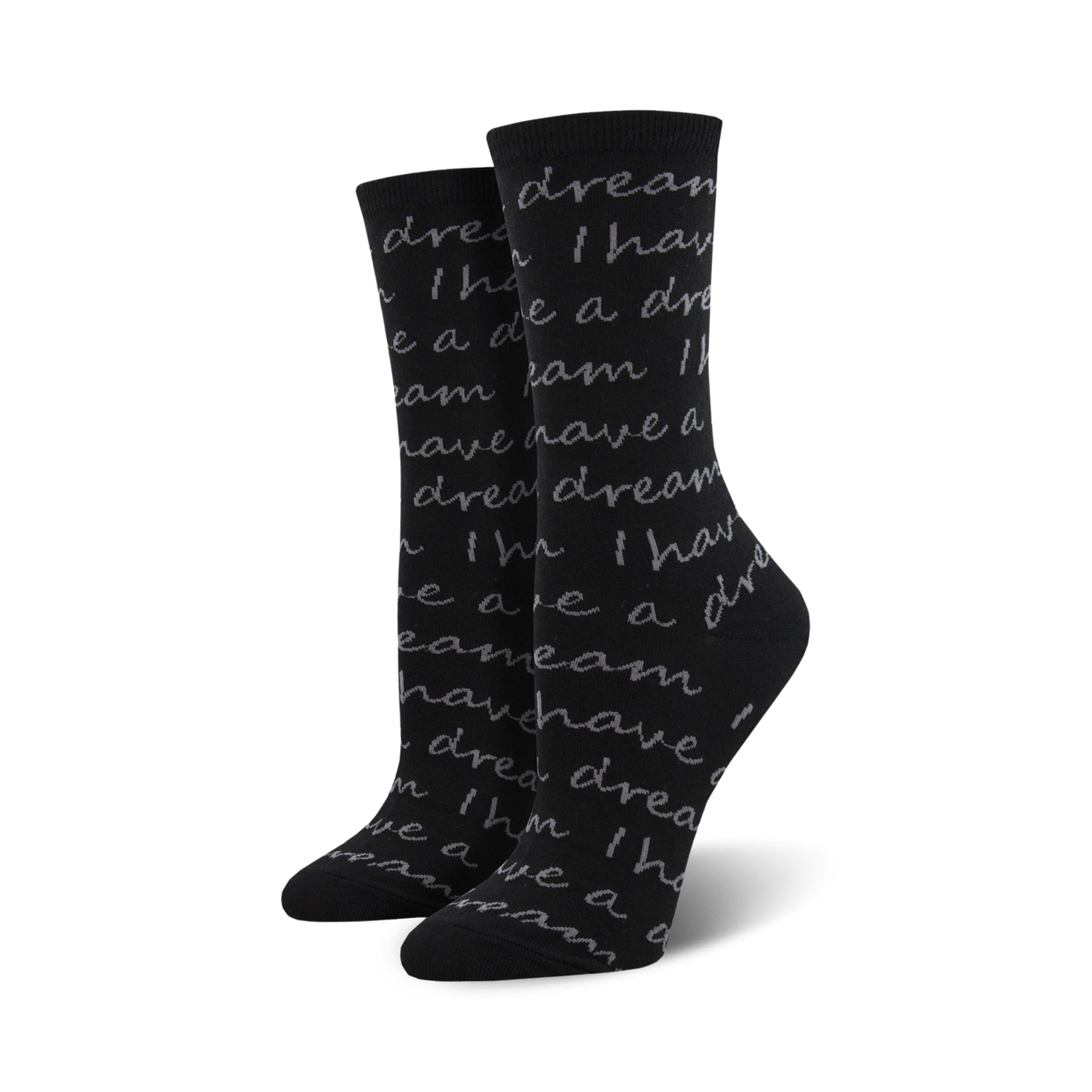 Pair of black crew socks with a grey repeating print of Martin Luther King Jr.'s 'I Have A Dream' speech.