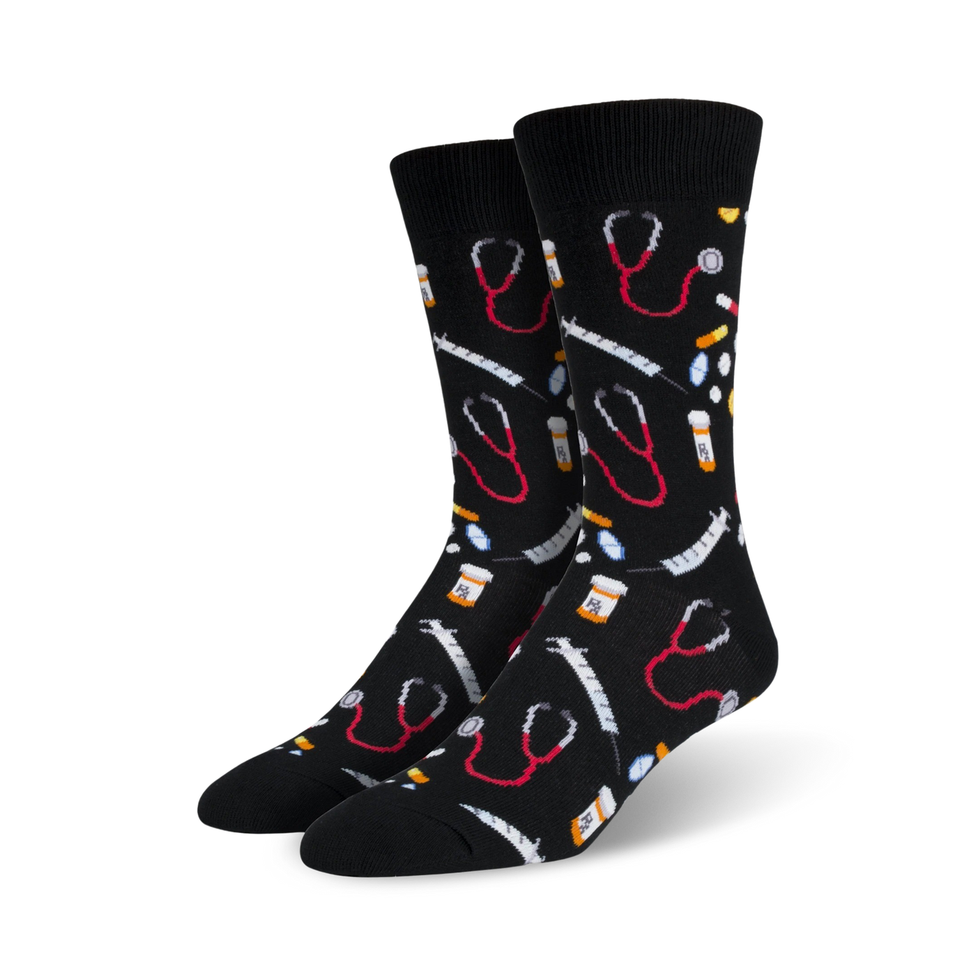 A pair of black crew socks with a fun pattern. The design includes red stethoscopes, syringes, and pills on a black background.